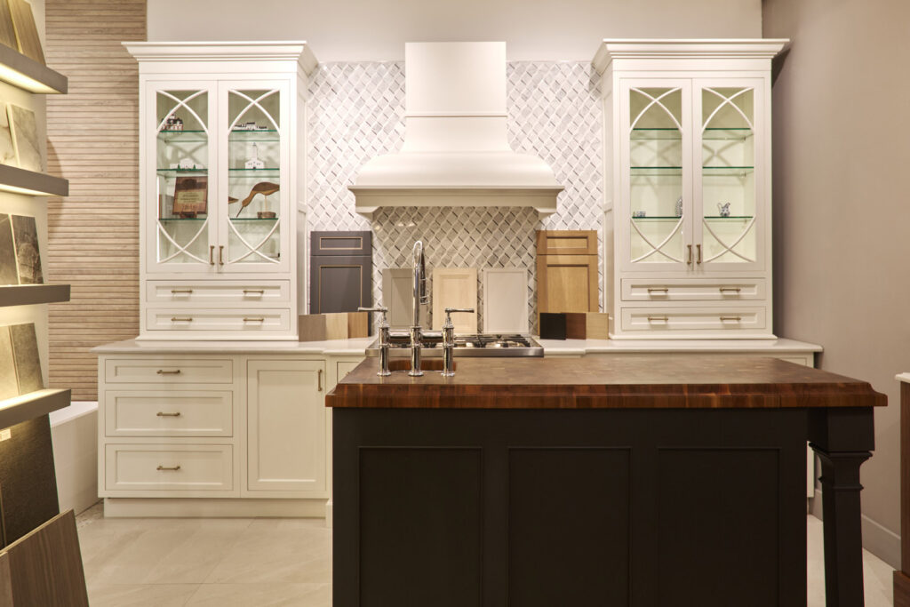 Cabinets : Plain and Fancy Cabinet Style : Inset Cabinet Door Style : Vogue Door Color : Celeste White Handles : Top Knobs, Kara Pulls Countertop : Caesarstone, Quartz Color name : London Grey Walnut butcher block : Grouthouse Lumber