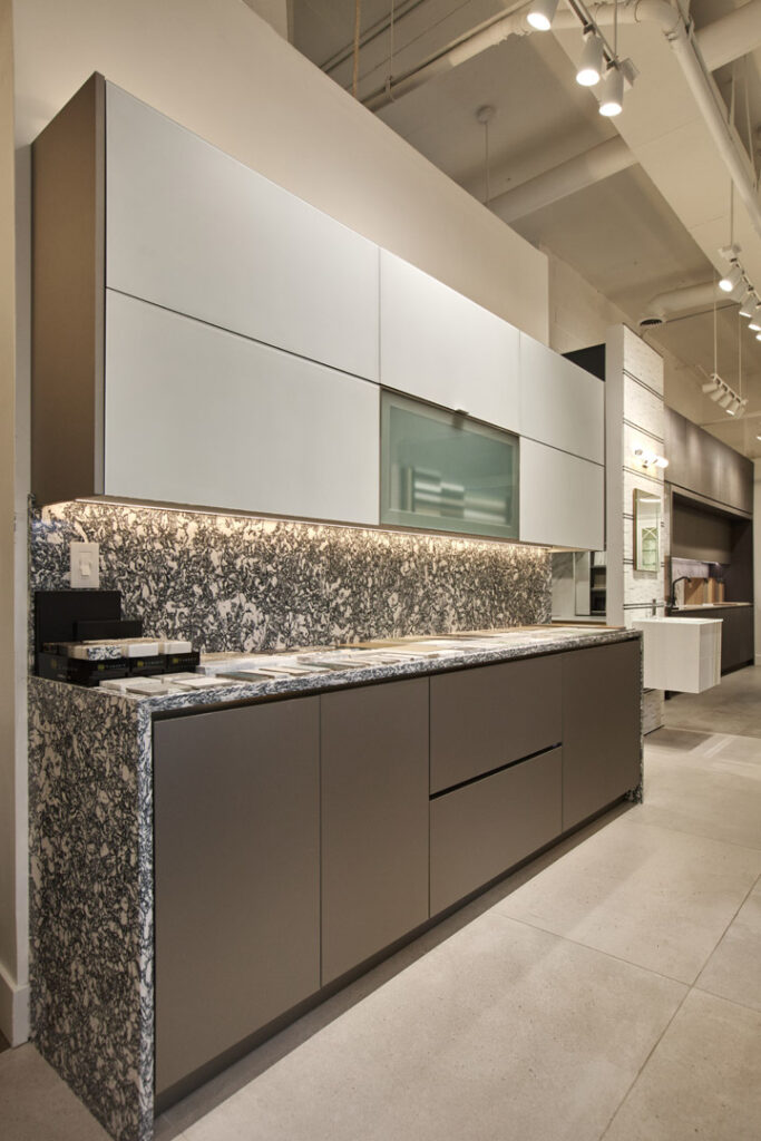 Countertop and backsplash : Cambria Color name : Rose Bay Bottom Cabinets : Miralis Collection ; Advance Engineered, Fenix Top Cabinets : Design Craft